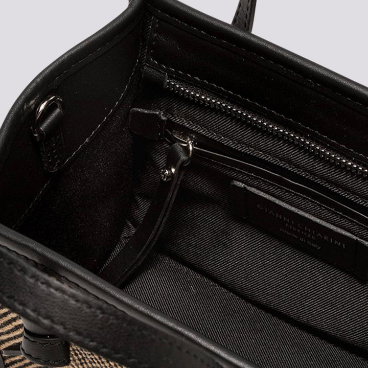 Borsa a mano Miss Marcella in tessuto spiga nero marrone